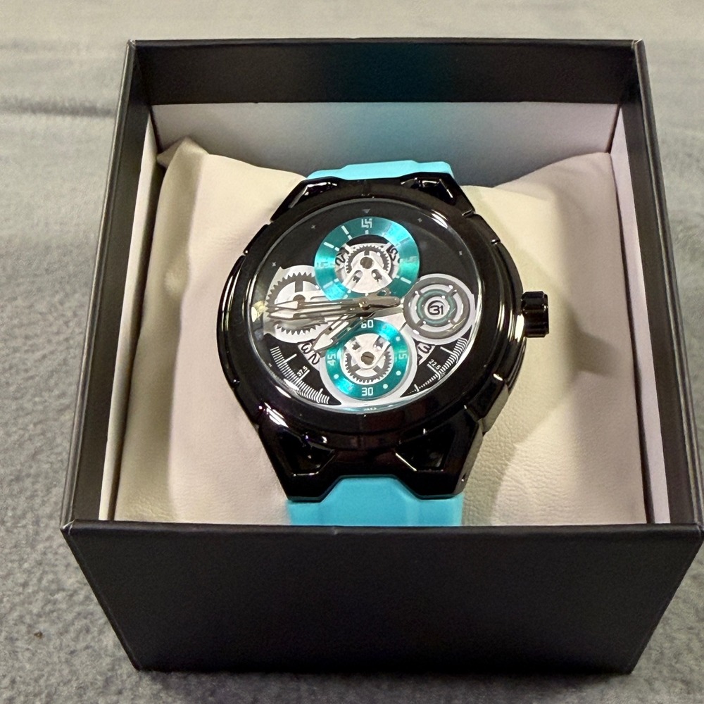 Activa Mens Watch Black Case Turquoise Silicone Strap Skeleton Dial New in Box